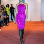 BVI model Dani Xaria smiles as she travels down the runway