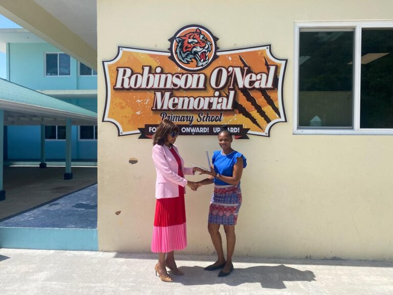Deputy Premier Presents Laptops to Robinson O’Neal Memorial Primary School’s Class of 2024