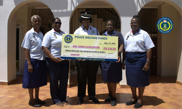 BVI Scouts and Girl Guides Receive $15,000 Donation from Police Fundraiser